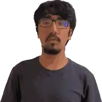 a pixelated image of a man wearing glasses