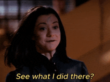 a woman says see what i did there in yellow text