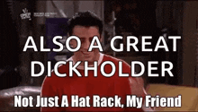 a man is standing in front of a sign that says `` also a great dickholder not just a hat rack my friend ''