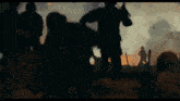 a blurred image of a group of soldiers in a field