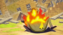 a man laying on the ground with a fire coming out of his back