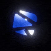 a dark background with blue triangles and a light shining through them