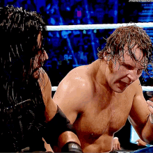 roman reigns dean ambrose punch punches punching