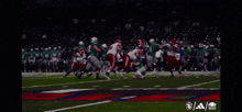 a football player with the number 61 on his jersey is laying on the ground