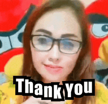 a woman with glasses says thank you in front of angry birds