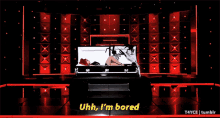 a woman in a coffin with the words uhh i 'm bored below her