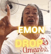 a woman in a white shirt with the words emon drop amanda on it