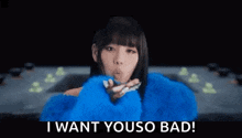 a woman is wearing a blue fur coat and says `` i want you so bad '' .