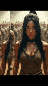 a woman with a ponytail is standing in front of a crowd of statues .