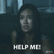 a woman in a white tank top is asking for help from netflix