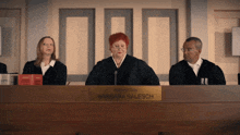 three judges sit at a table with a sign that says barbara salesch