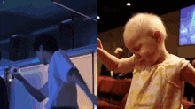 a man and a little girl are playing a video game together