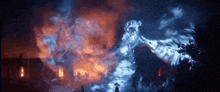 a ghost is coming out of a burning building