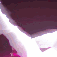 a close up of a purple and white background with a triangle in the middle