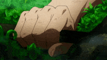 a close up of a person 's fist with the letters y and m on it