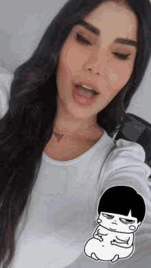 a woman in a white shirt is taking a selfie with a black and white drawing of a person on her arm