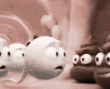 a bunch of cartoon characters with big eyes on them