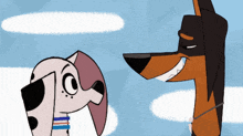 a dalmatian and a dachshund looking at each other