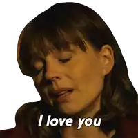 a close up of a woman 's face saying " i love you "