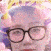 a blurry picture of a person wearing glasses with the year 2022 written in the background