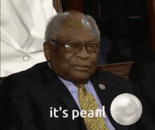 a man in a suit and tie says " it 's pearl " in front of a pearl