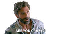 a man with a beard is asking are you crazy