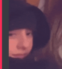 a blurry picture of a person wearing a hat