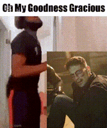 a man with a beard is standing next to another man kneeling down