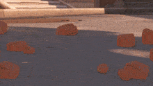 a close up of a video game character 's foot with rocks around it
