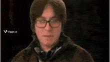 a man wearing glasses and a brown jacket has a viggle.ai watermark on his face