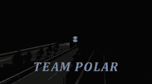 a dark highway with the words team polar in blue letters