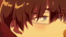 a close up of a person 's face with glasses