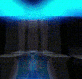 a blue light is shining through a dark room