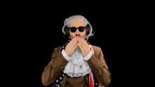 a man wearing headphones and an american flag scarf