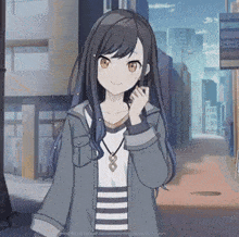 a girl with long black hair is wearing a grey jacket