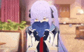 a girl with purple hair is holding a heart shaped object in front of her face .