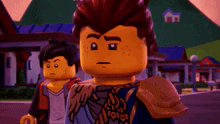 two lego figures are standing in front of a building