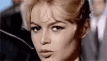 Brigitte Bardot Wink GIF - Brigitte Bardot Wink Come Over GIFs