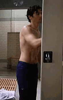 Griffin Munro Getting Dressed GIF - Griffin Munro Getting Dressed General Hospital GIFs