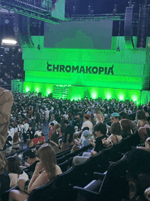 the word chromakopia is on a green sign