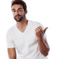 a man with a beard is wearing a white t-shirt and giving a thumbs up sign