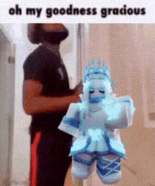 a man is standing next to a cartoon character that looks like a princess .