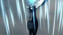 a woman in a black suit is holding a sword