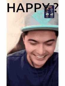 a man wearing a blue shirt and a blue hat is smiling with the word happy behind him