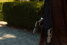 a person is walking down a cobblestone street with the word kepler written on the bottom