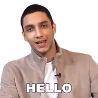 a man wearing a tan jacket says hello
