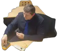 a man in a blue shirt and tie is using a yellow multimeter