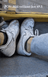 a person 's feet are shown with a caption that says pov : mas velikost bot 49.5