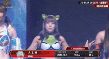 a female wrestler with azm written on her shirt