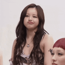 a woman making a funny face with her mouth open